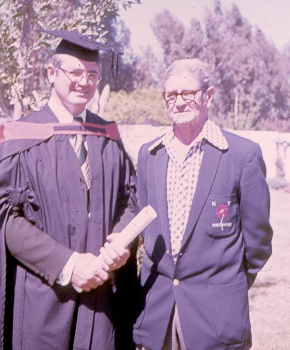 Picture of Eddie and his father at Eddie's graduation